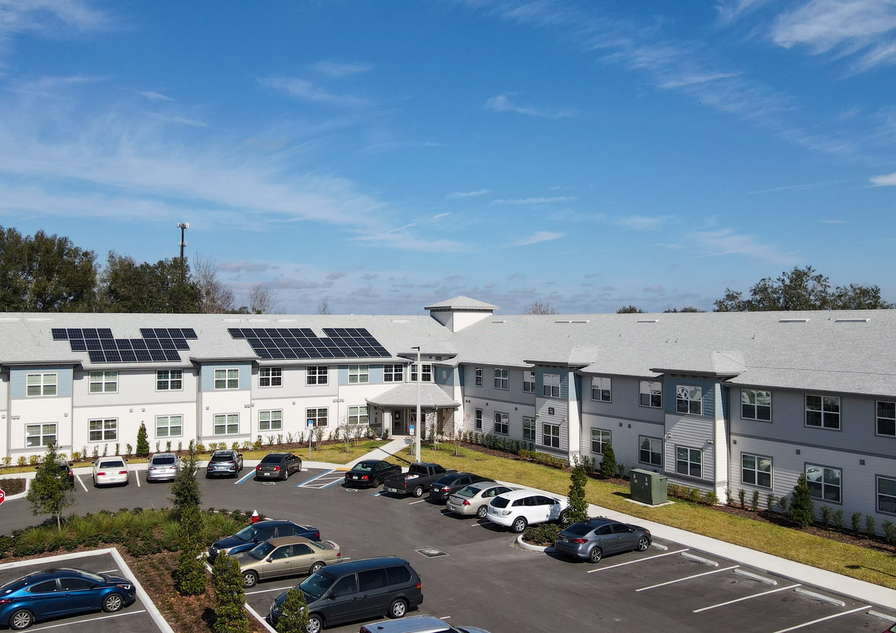Banyan Reserve Seniors, senior living community offering active adult living and independent living in Lakeland, FL, exterior and parking lot