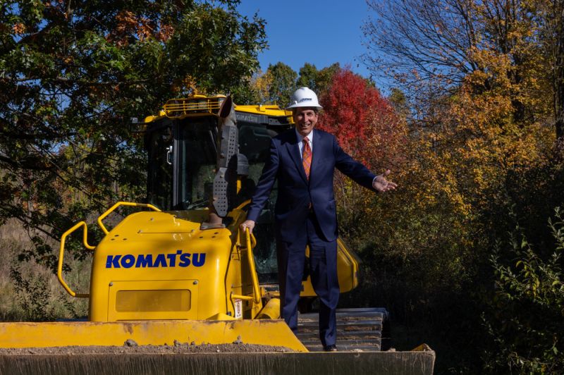 CEO David Erickson on a construction vehicle